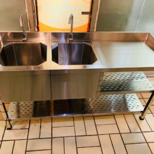 double bowl sink with utensil storage